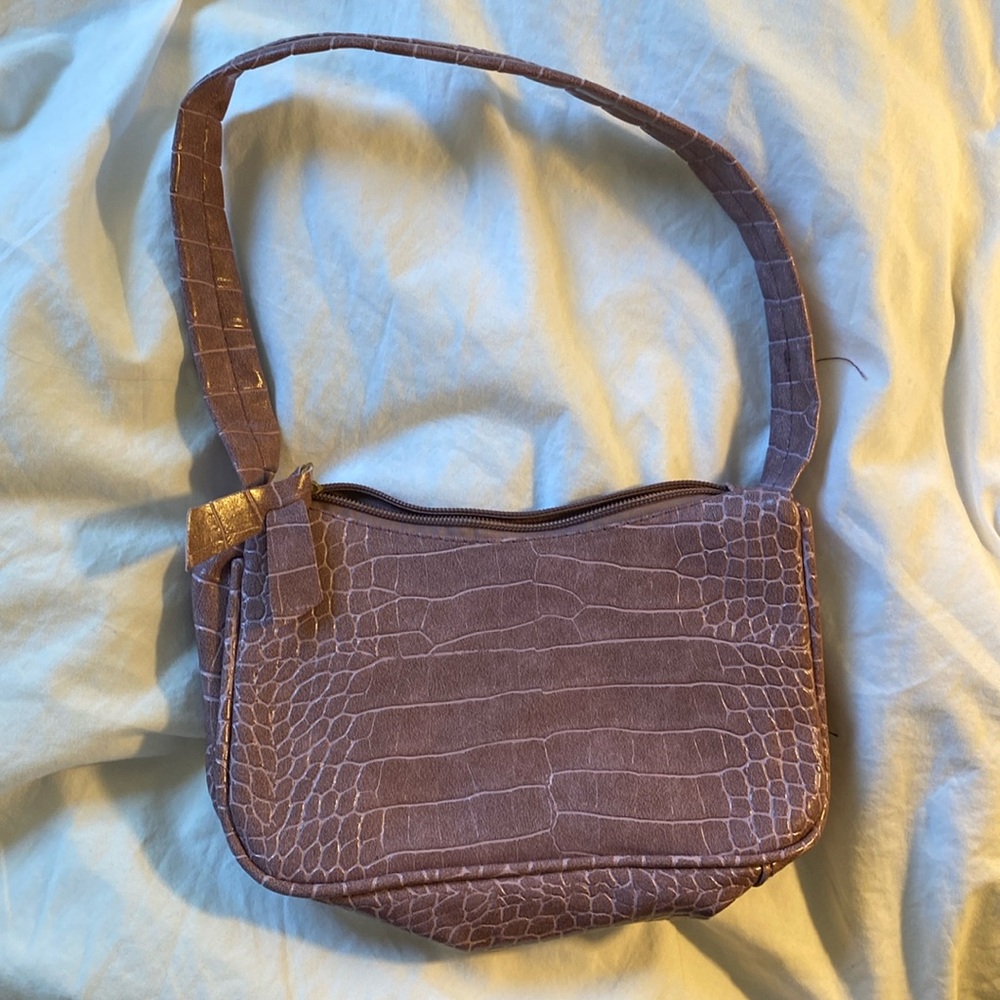 Cute purple bag.  Trendy.